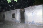 Remains of the Agatu Church. Only the shell remains but services are still held there where 113 died.